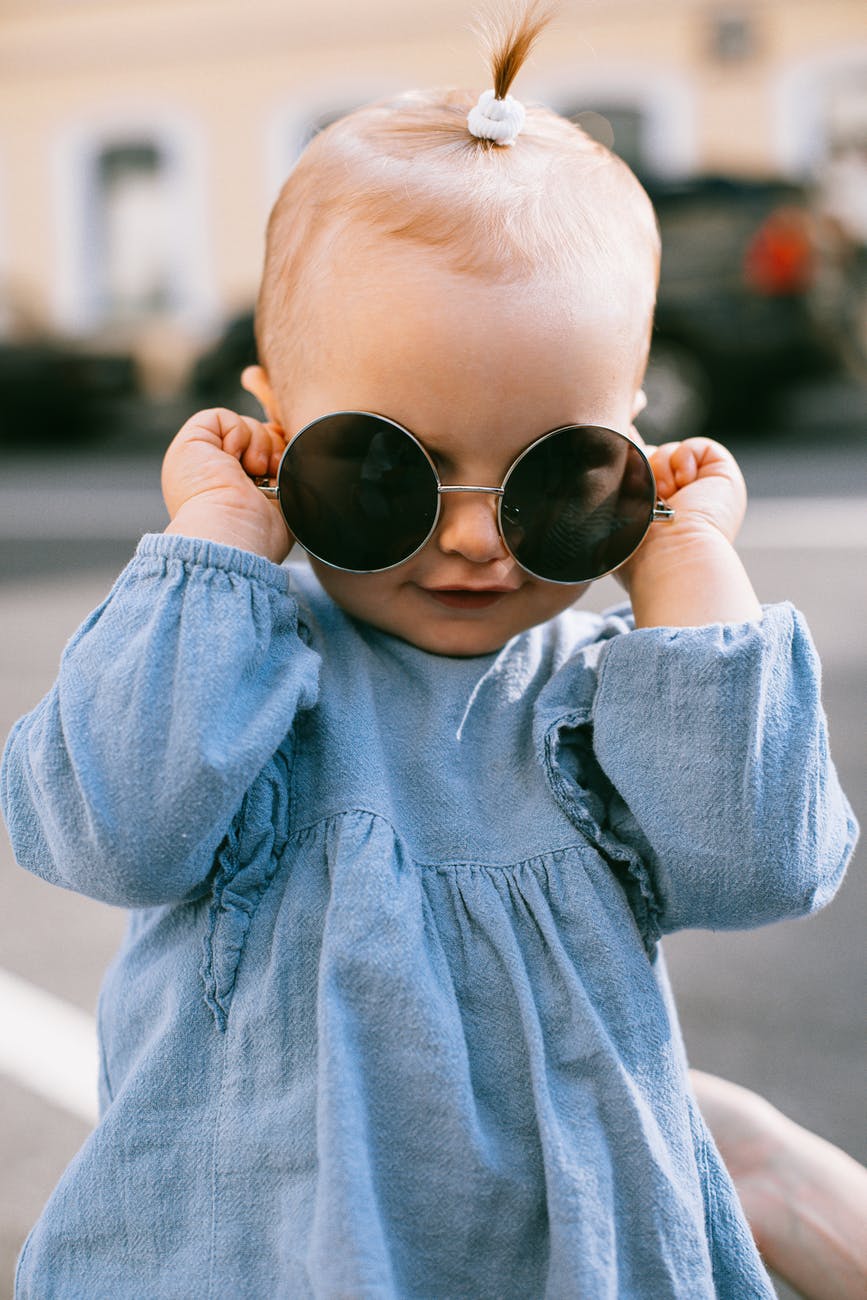 photo of baby wearing sunglasses